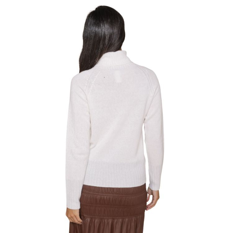 Cashmere blend coltrui met lurex draad op manchetten en rand