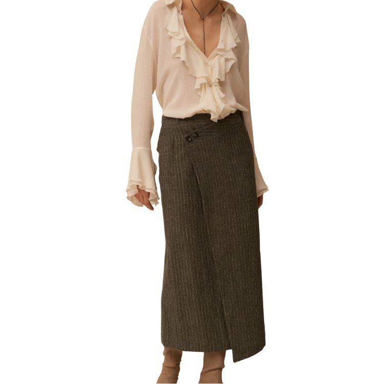 Wool muslin shirt with ruffles and calla cuffs.